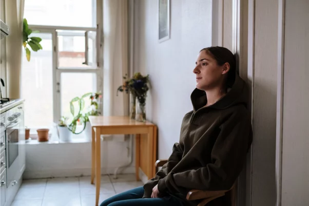 Woman sitting alone
