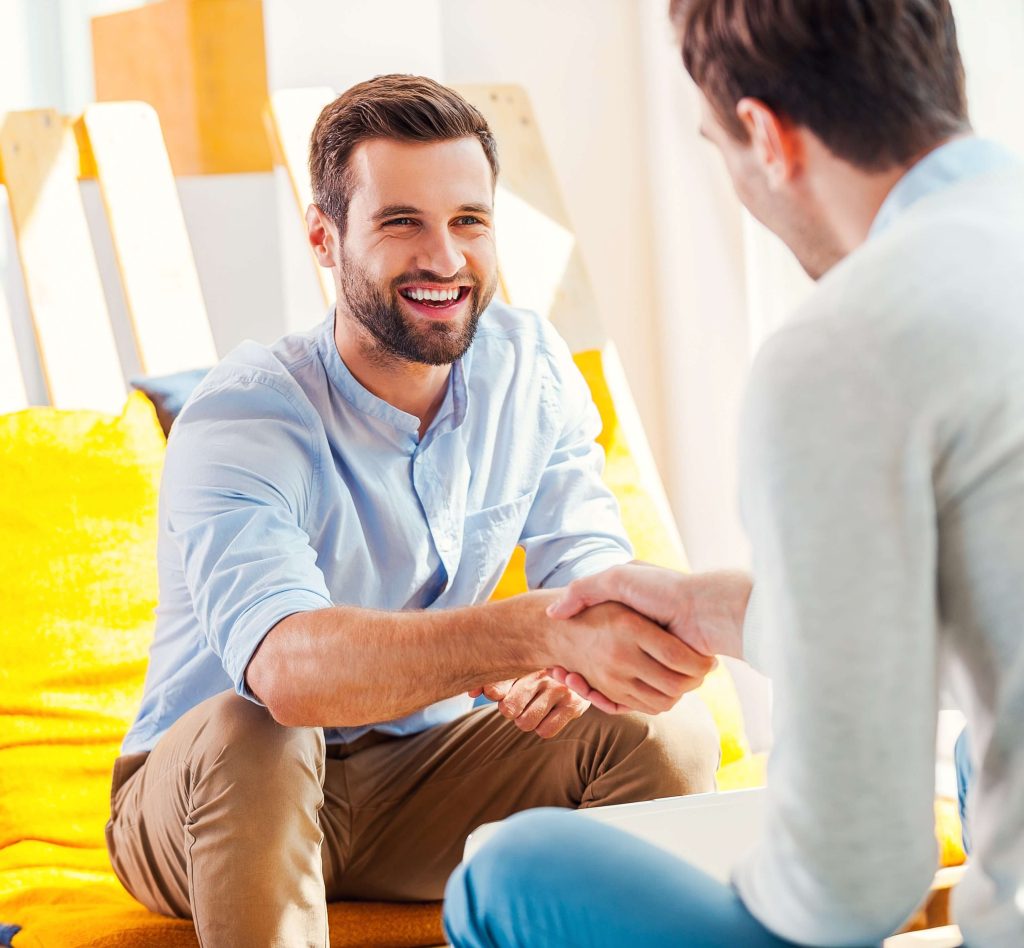 Psychologist in London Ontario welcoming new client.
