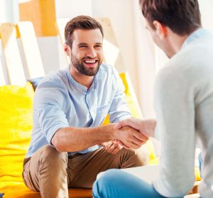 Psychologist in London Ontario welcoming new client.